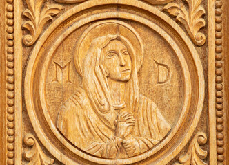 Wooden sculpture representing Saint Mary, mother of Jesus at the Dumbrava monastery - Romania