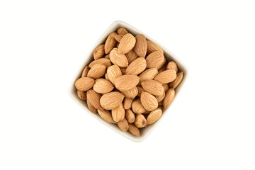 Top view of almond in bowl isolated on white background with clipping path