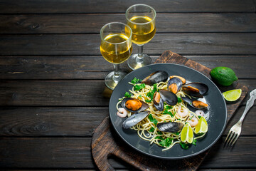 Mediterranean food. Seafood spaghetti with clams and white wine.