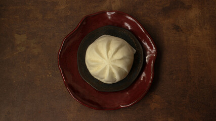 Close up Chinese Steamed Bun on Copper Background