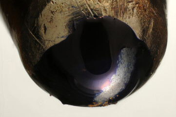 Extreme close up of the tip of a ballpoint pen