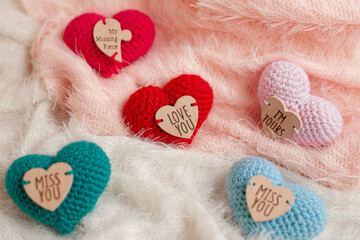 knitted hearts on fabric