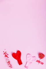 Concept gifts for your loved ones, for valentines day, womens day, mothers day or birthday.  Balloons and heart shaped candy. Copy space. Top view