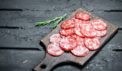 Sliced salami on the Board.