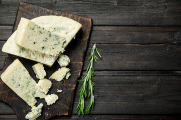 Blue cheese with rosemary branches.