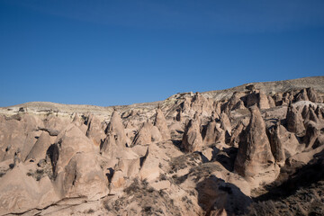 Fototapeta na wymiar Fairy Chimneys in Cappadocia Imagination Valley