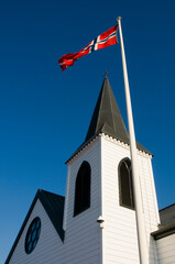 Norwegian flag flying outside the Norwegian church in Cardiff Bay, Wales