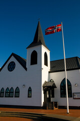 Norwegian flag flying outside the Norwegian church in Cardiff Bay, Wales