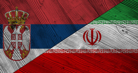 Background with flag of Serbia and Iran on wooden divided table. 3d illustration