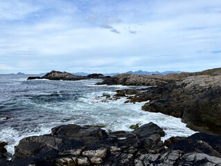Amazing rocky ocean bay, rocky coast, huge stones, seascape, cloudy sky, Nordic seascape