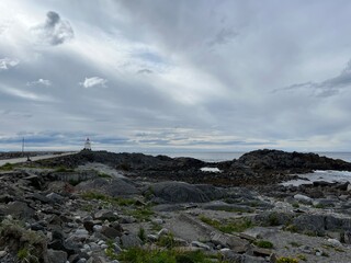 Amazing rocky ocean bay, rocky coast, huge stones, seascape, cloudy sky, Nordic seascape