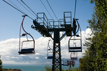 chairlifts descending towards the beach, Needles Park, Isle of Wight,