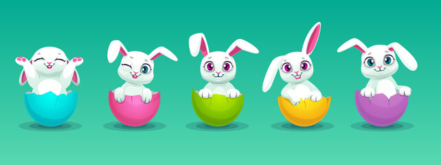 Cartoon cute white Easter bunnies in the eggs.