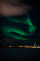 Aurora Boreal sobre cielo de Tromsø