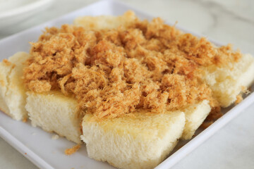 Flossed pork bread on a plate 