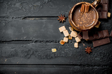 Hot chocolate with cinnamon sticks.