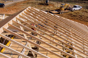 Roof construction details from roofing worker who is working on building of new house