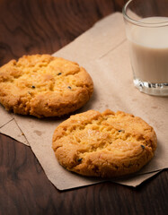 Closeup delicious Hong Kong butter cookie recipes on papers and wooden table.