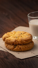 Closeup delicious Hong Kong butter cookie recipes on papers and wooden table.