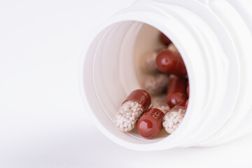 Pill bottle on white background
