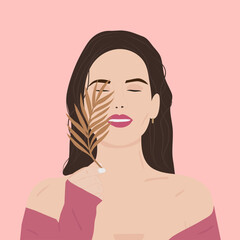 Minimalistic portrait of a girl with a leaf in pink colors