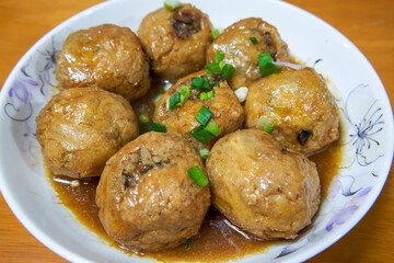 A delicious Chinese home-cooked dish, pork stuffed with avocado