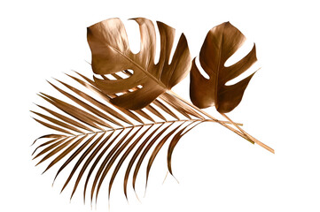 Fototapeta premium Tropical leaves in gold color on white space background.Abstract monstera leaf decoration design.clipping path