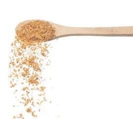 Fried Garlic pour fall down from wooden spoon, golden yellow fried garlic float abstract fly. Beautiful fried garlic splash stop in air, food object design. White background isolated high speed freeze