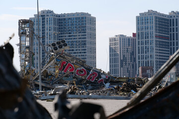 Russian missile destroyed cars and shopping center Retroville in Kyiv, Ukraine