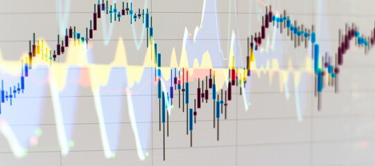 Charts of financial instruments for technical analysis. Stock trading market background as concept.