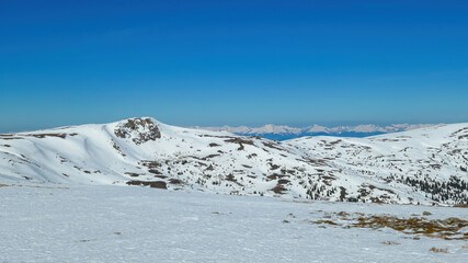 Scenic view of snow covered alpine hills on hiking trail from Ladinger Spitz to Gertrusk, Saualpe,...