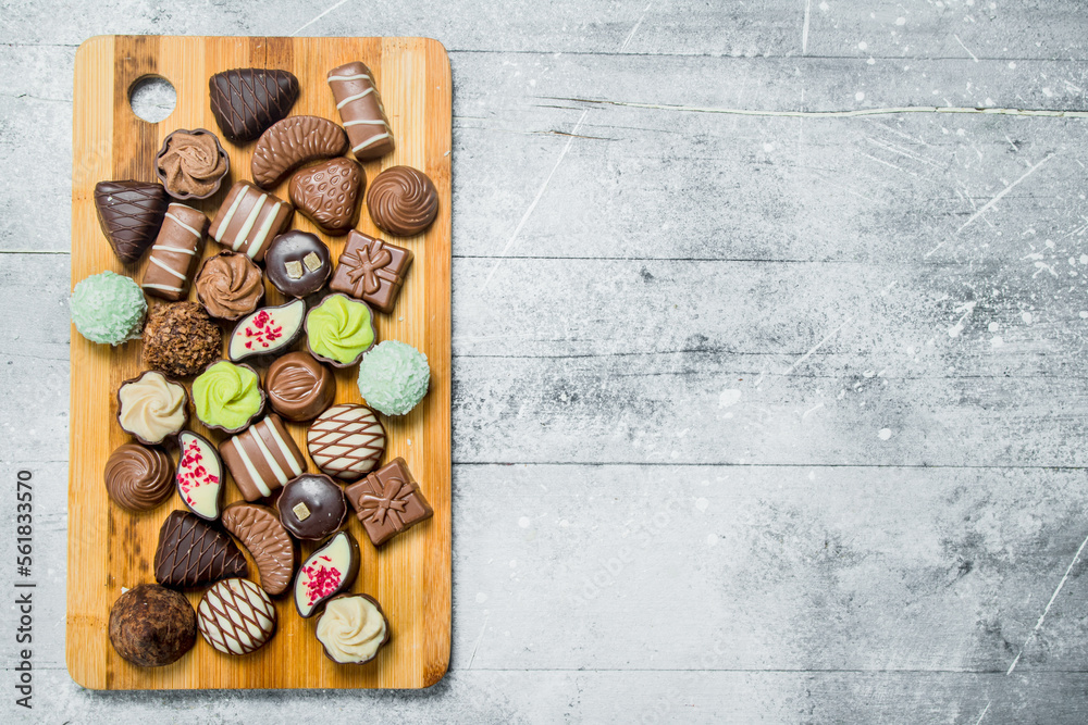 Canvas Prints Various chocolate sweets on the Board.