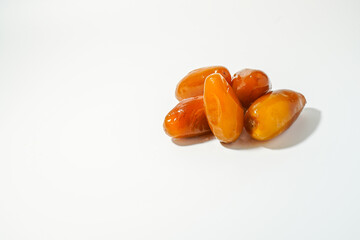 Fresh ripe yellow dates, fresh dates ruthob isolated on white background