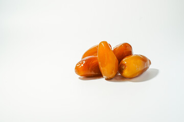 Fresh ripe yellow dates, fresh dates ruthob isolated on white background
