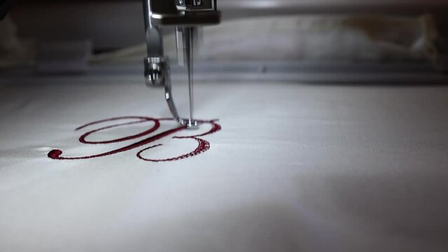 Inscription bride with burgundy thread. Wedding day preparation. Elegant bridal lingerie. Close up. Full Hd Video.
