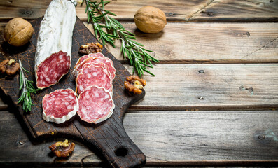 Salami with nuts and rosemary.