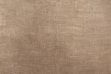 Fototapeta Cloth. The texture of the burlap fabric is close-up. Packaging material. Background Of Burlap Hessian Sacking obraz