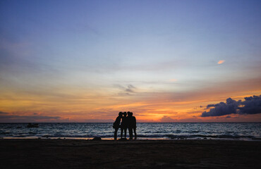 Fantastic sunset shared by four girls friends travelers in Thailand