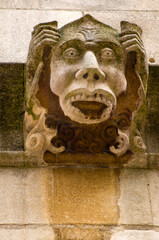 A surprised looking gargoyle on an Oxford College UK
