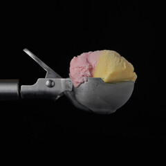 Ice cream scoop on black background