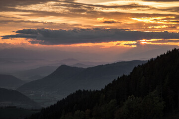 nice sunset and evening mood seen from saualm in carinthia