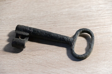 old key on wood background