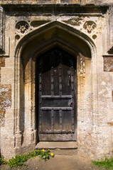Fototapeta na wymiar Church door at West Adderbury in the Cotswolds, Oxfordshire, UK