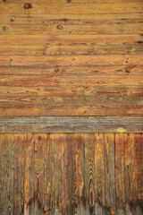 Brown textured background made of natural wood. Wooden panel made of planks
