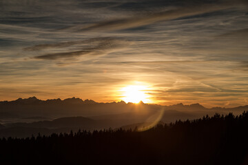 Sunset seen from Lorenziberg over the carithian valleys towards the karawanken mountain range on the austrian and Slovenian border.