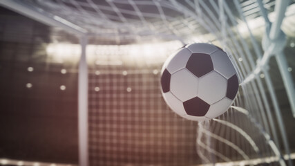 Close up of a soccer ball scoring a goal
