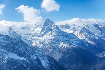 High snowy mountains. Beautiful landscape. National park, active lifestyle and winter sports.