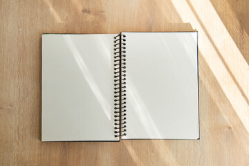 notebook on wood background