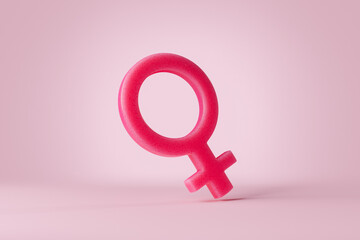 red female sign against pink background