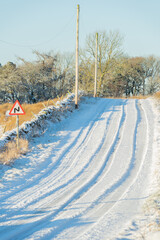 Snow covered country road in Northumberland, UK